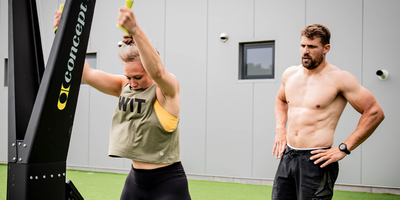 One session Fit_man_and_woman_working_out_on_a_concept_2_ski_erg.jpg